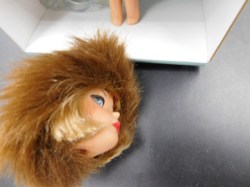 gold glamour barbie head side